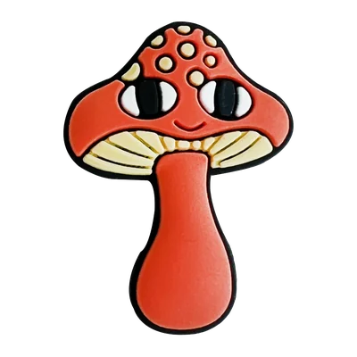 Smiling orange mushroom charm with a red spotted cap